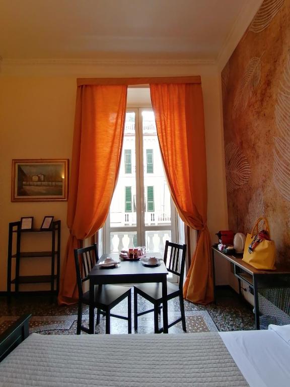 Posteľ alebo postele v izbe v ubytovaní B&B Genova Centro