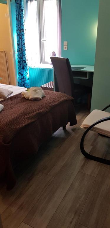 Postel nebo postele na pokoji v ubytování Logis hôtel restaurant les Carillons