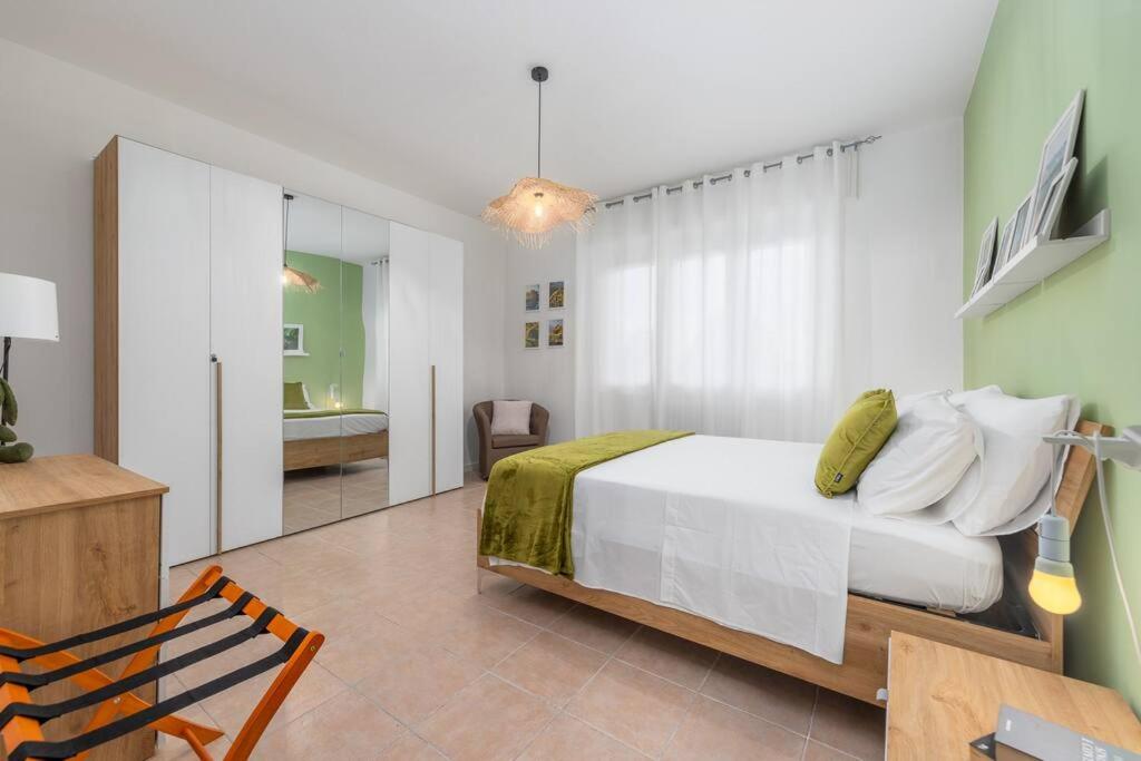 Postel nebo postele na pokoji v ubytování VillaPino 27 - New Apartment Como