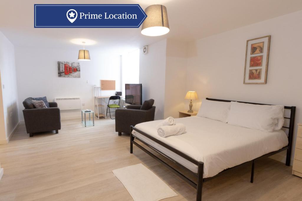 Ένα ή περισσότερα κρεβάτια σε δωμάτιο στο Cosy Studio Apt in Preston near City Centre