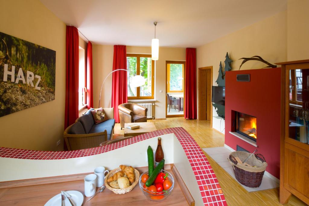 Posezení v ubytování Plumbohms ECHT-HARZ-HOTEL