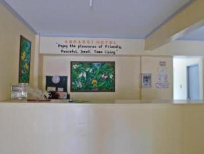 a hospital room with a sign on the wall at Abrassi hotel tayum abra in Bangued