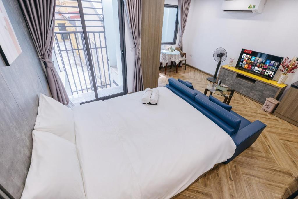 Postel nebo postele na pokoji v ubytování Westlake Emerald Suites