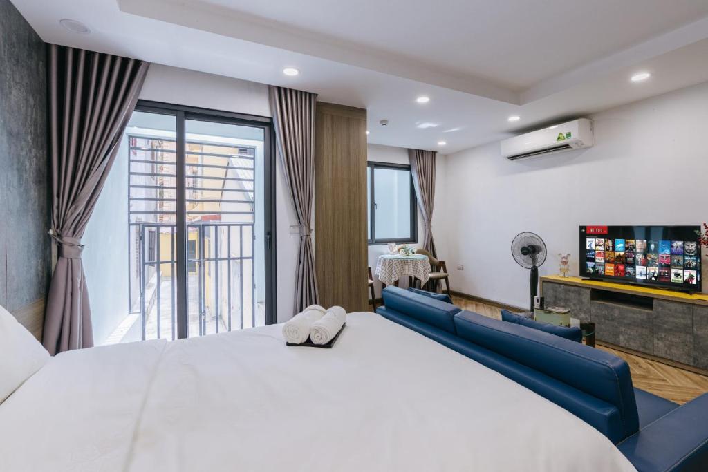 Postel nebo postele na pokoji v ubytování Westlake Emerald Suites