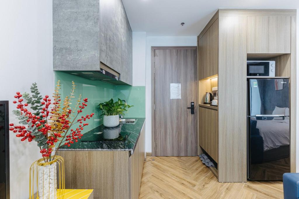 Kuchyň nebo kuchyňský kout v ubytování Westlake Emerald Suites