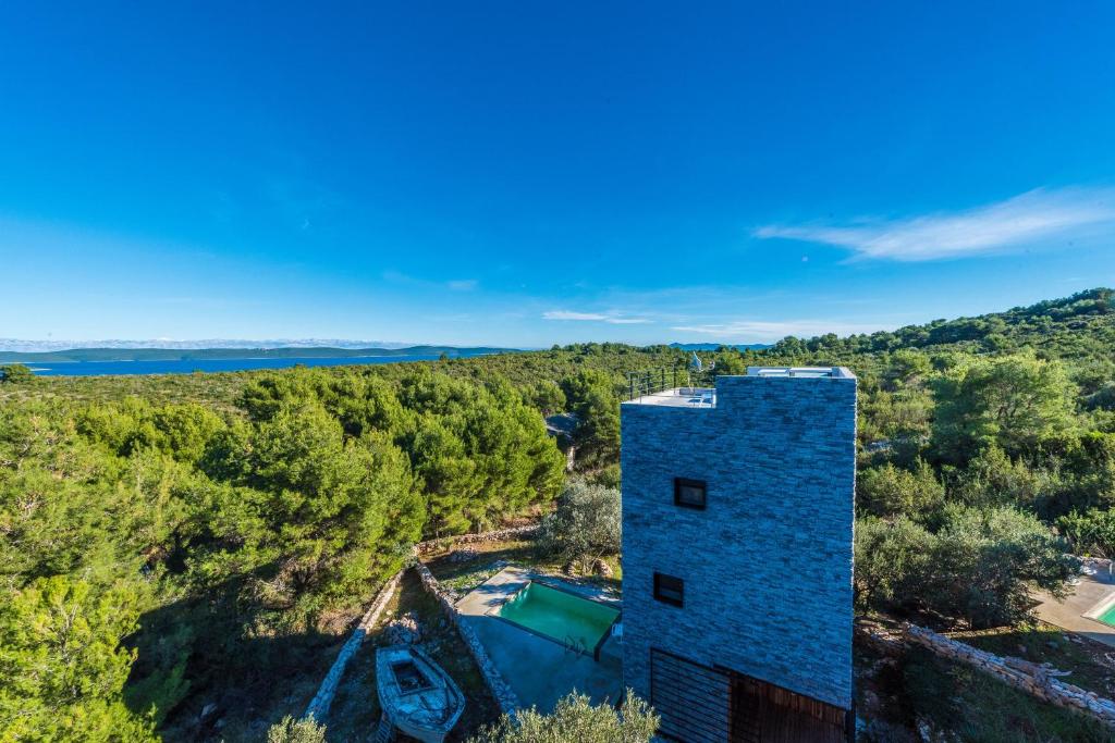 an aerial view of a building in the woods at Villa Gordan - Happy Rentals in Dragove