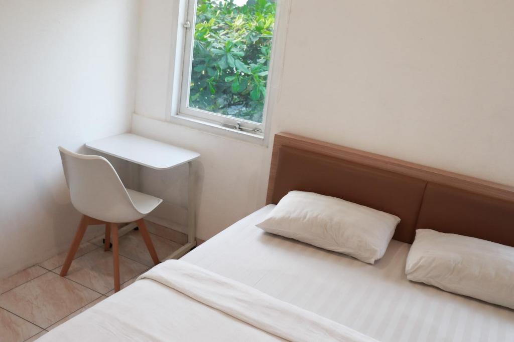 Postel nebo postele na pokoji v ubytování Best Canggu Hostel