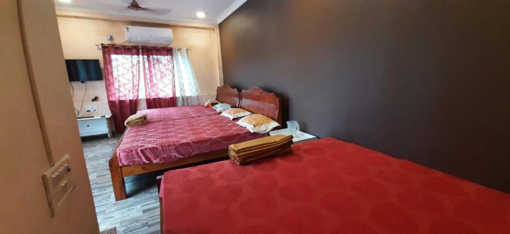 Postel nebo postele na pokoji v ubytování Le Grace Beachview