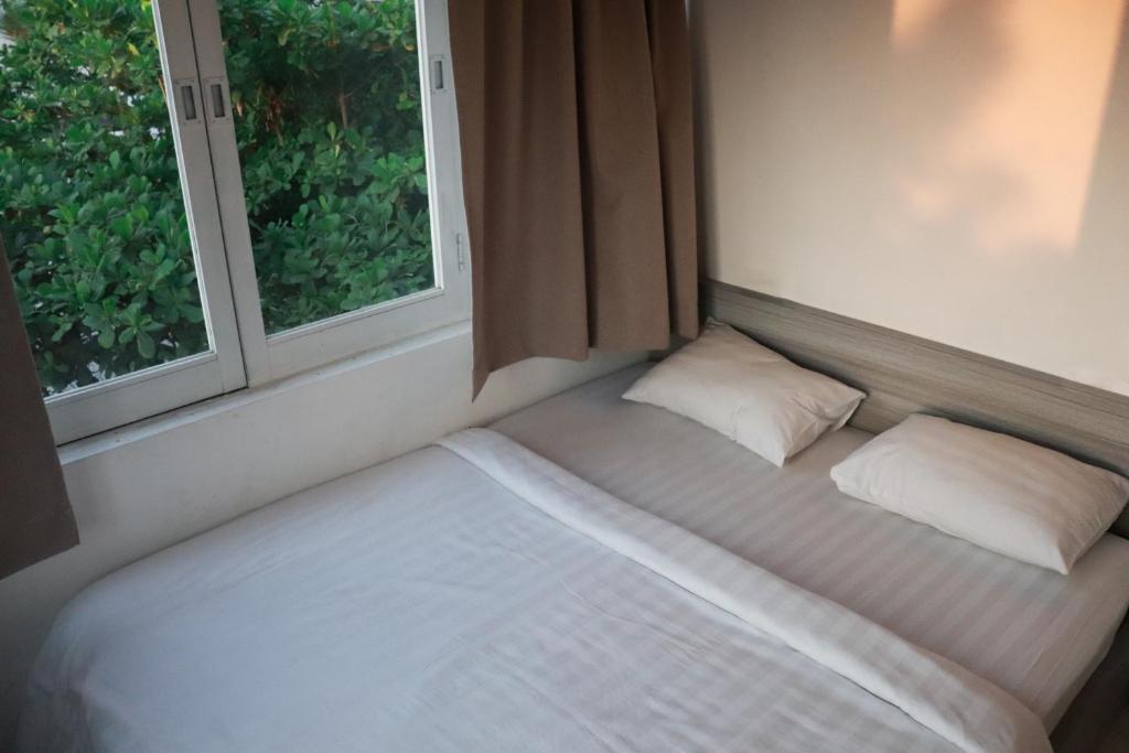 Postel nebo postele na pokoji v ubytování Best Canggu Hostel