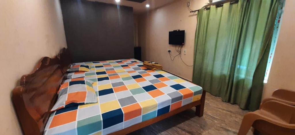 Postel nebo postele na pokoji v ubytování Le Grace Beachview
