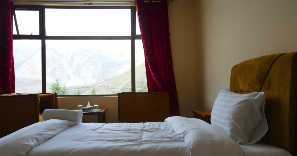 Postel nebo postele na pokoji v ubytování Apex Hotels and Resorts Hussaini