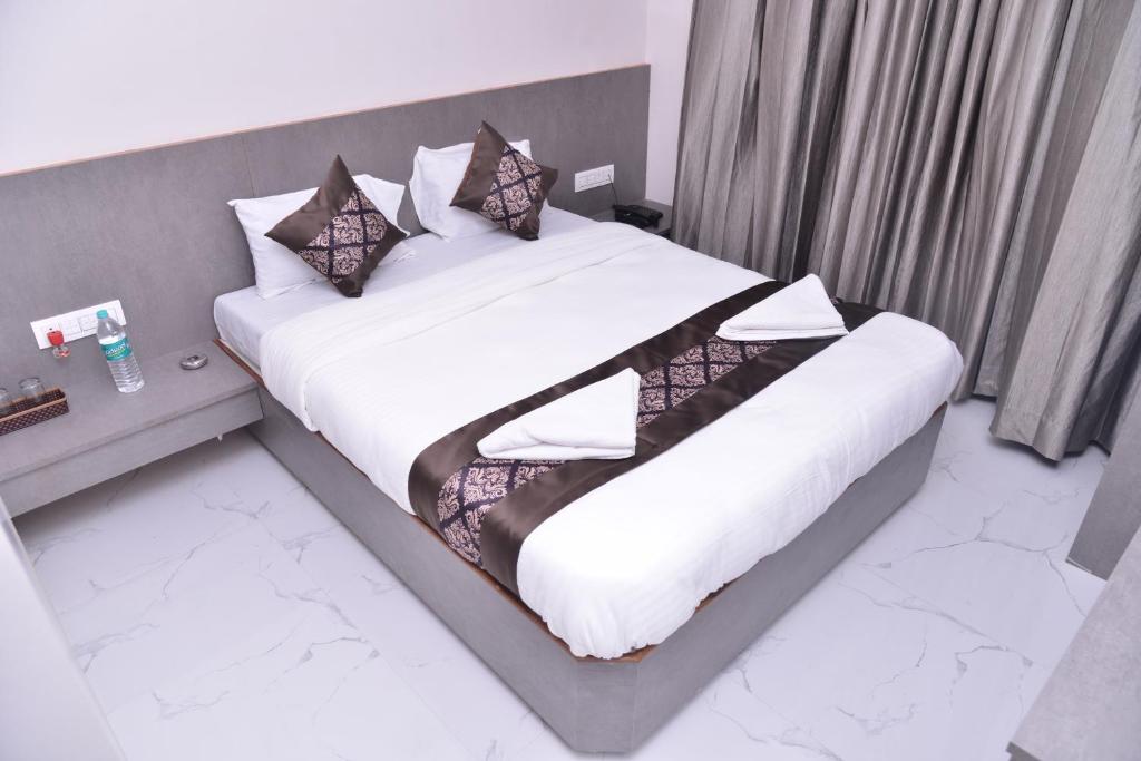 Postel nebo postele na pokoji v ubytování Hotel D Square