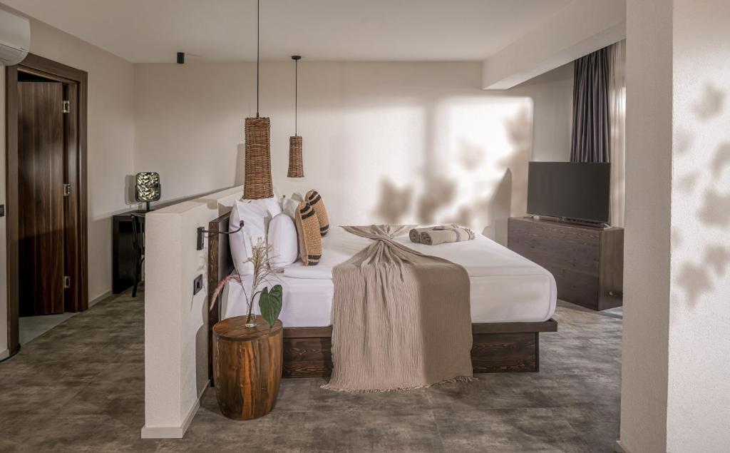 Postel nebo postele na pokoji v ubytování Balmy Beach Resort Kemer