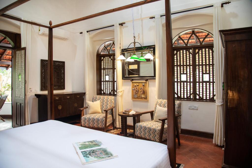 Posezení v ubytování Lamrin Ucassaim Goa An Indo Portuguese Hotel