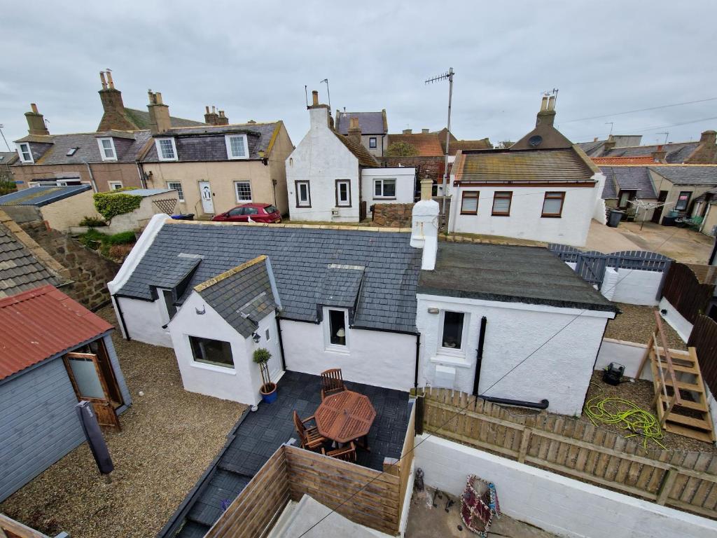 an aerial view of a group of houses at Coopers Cottage in Peterhead