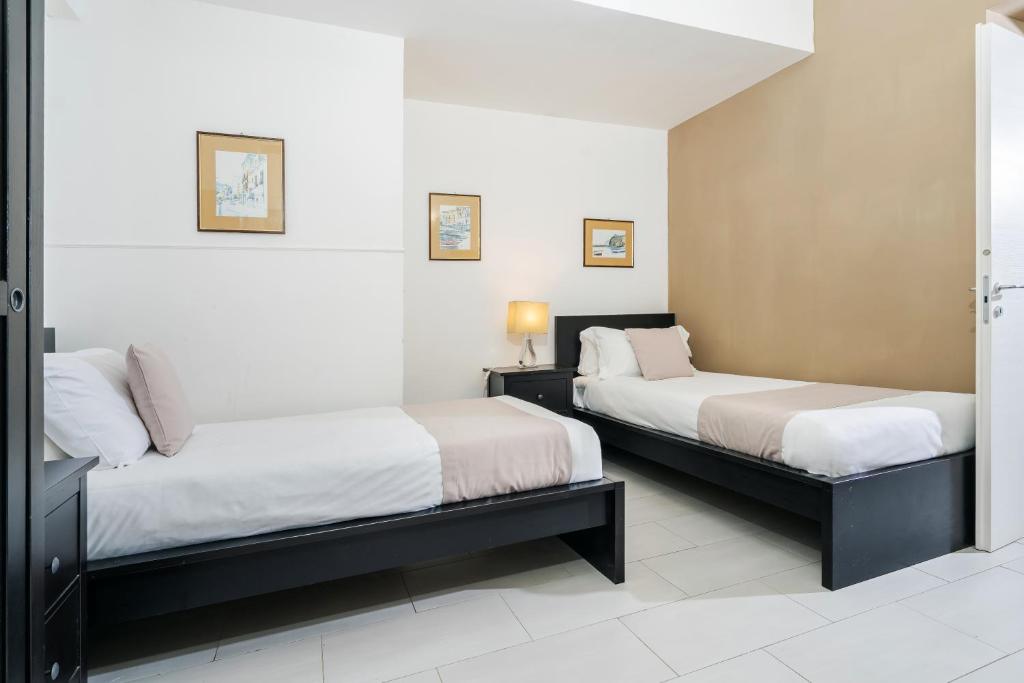 Posteľ alebo postele v izbe v ubytovaní Residence Le Axidie