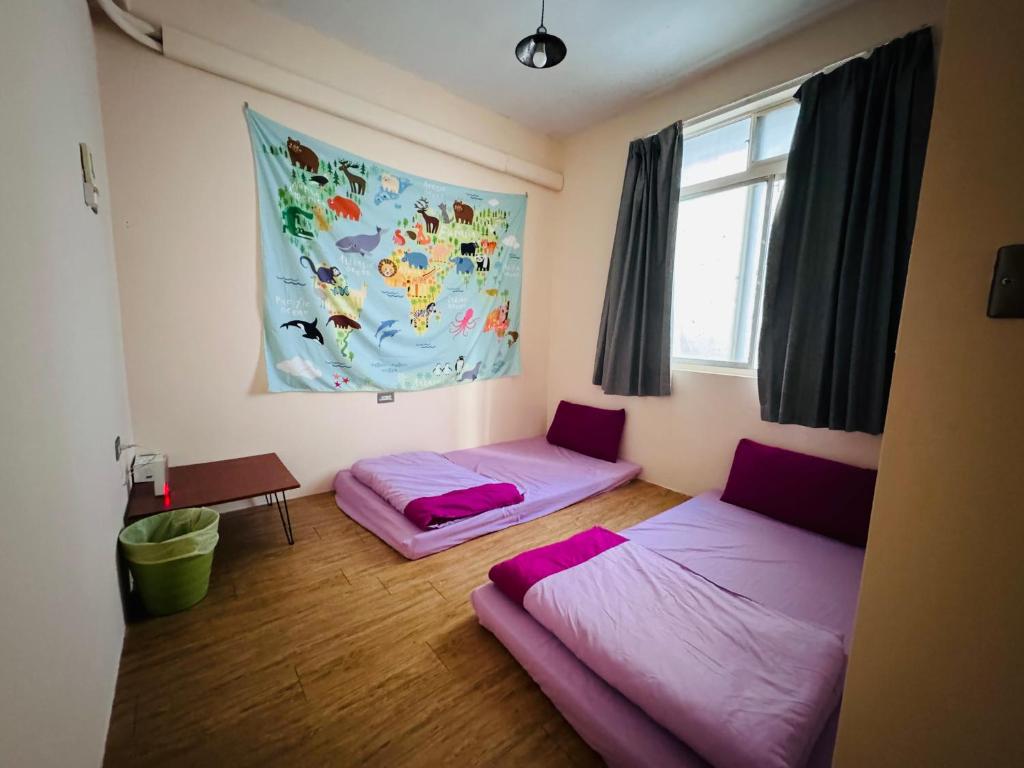 Postel nebo postele na pokoji v ubytování MatchBox Hostel