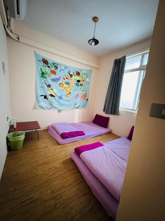 Postel nebo postele na pokoji v ubytování MatchBox Hostel