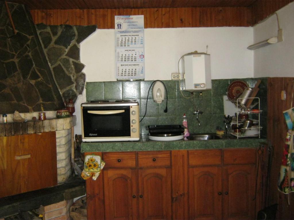 Kuchyň nebo kuchyňský kout v ubytování Villa Lalka