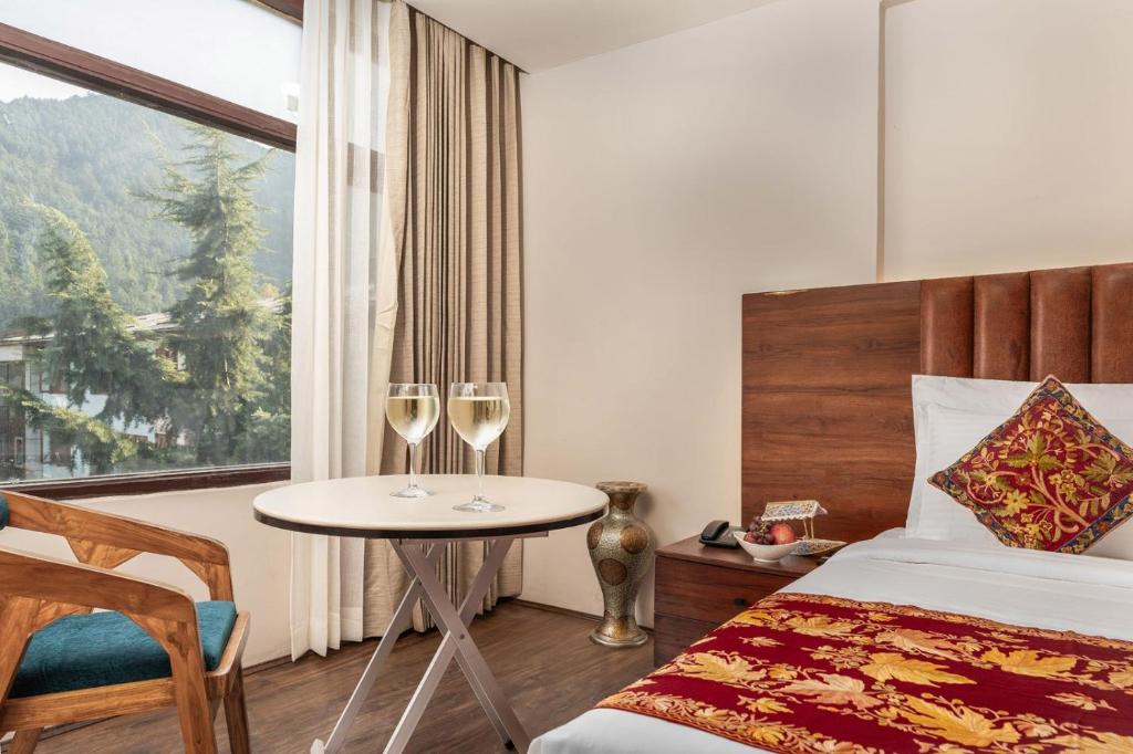 Postel nebo postele na pokoji v ubytování Hotel 11 Boulevard