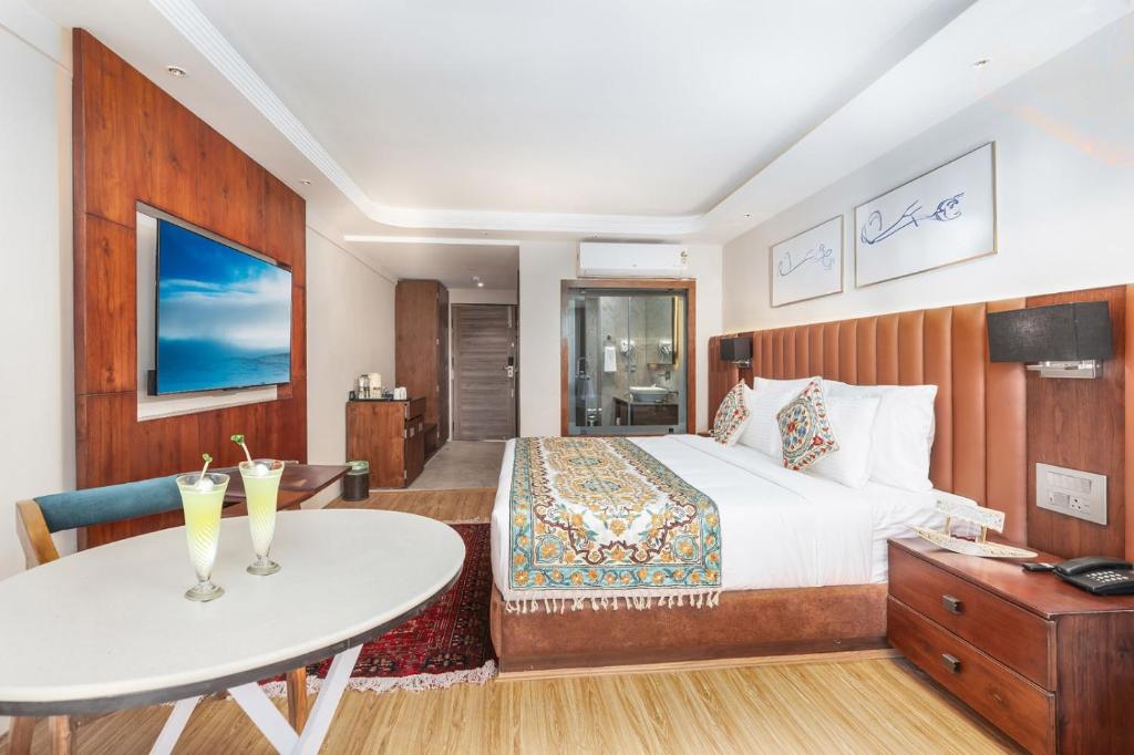 Postel nebo postele na pokoji v ubytování Hotel 11 Boulevard