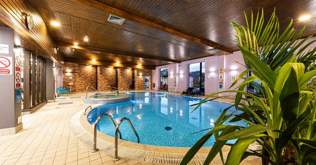 a pool in the middle of a building at Scotland's Spa Hotel in Pitlochry
