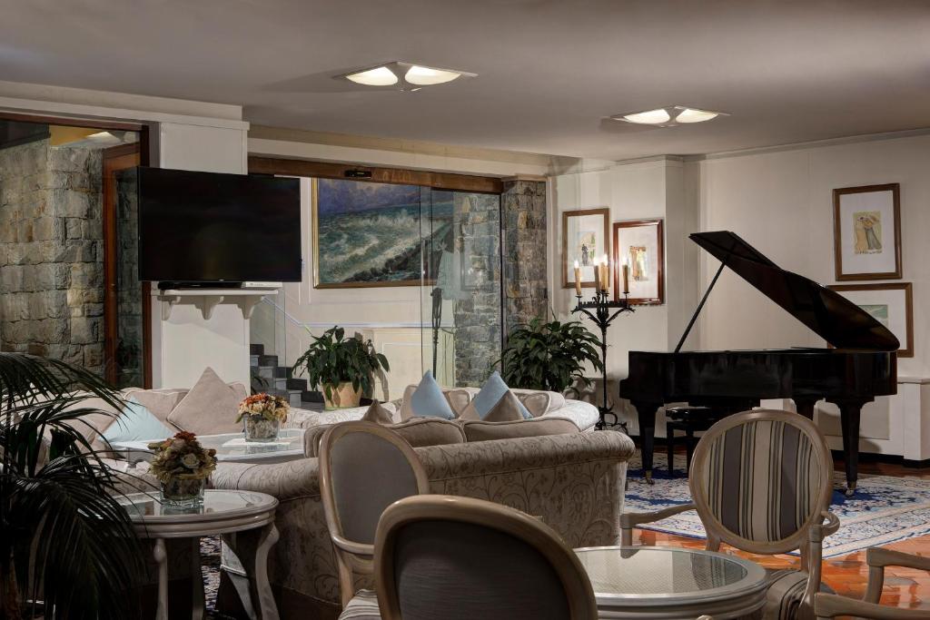 TV a/nebo společenská místnost v ubytování Hotel Cenobio Dei Dogi