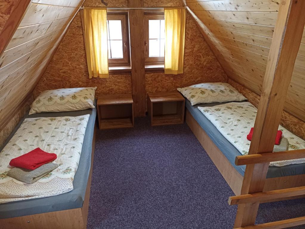 Postel nebo postele na pokoji v ubytování Chata Dáša
