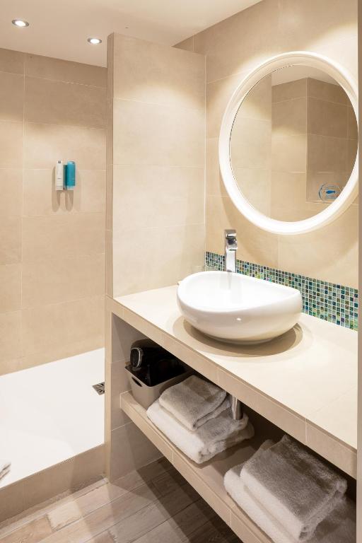 Ванная комната в Hotel Residence Les Medes