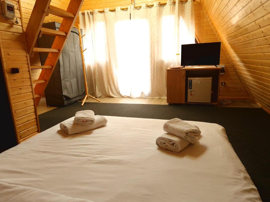 Postel nebo postele na pokoji v ubytování Stelele Coziei