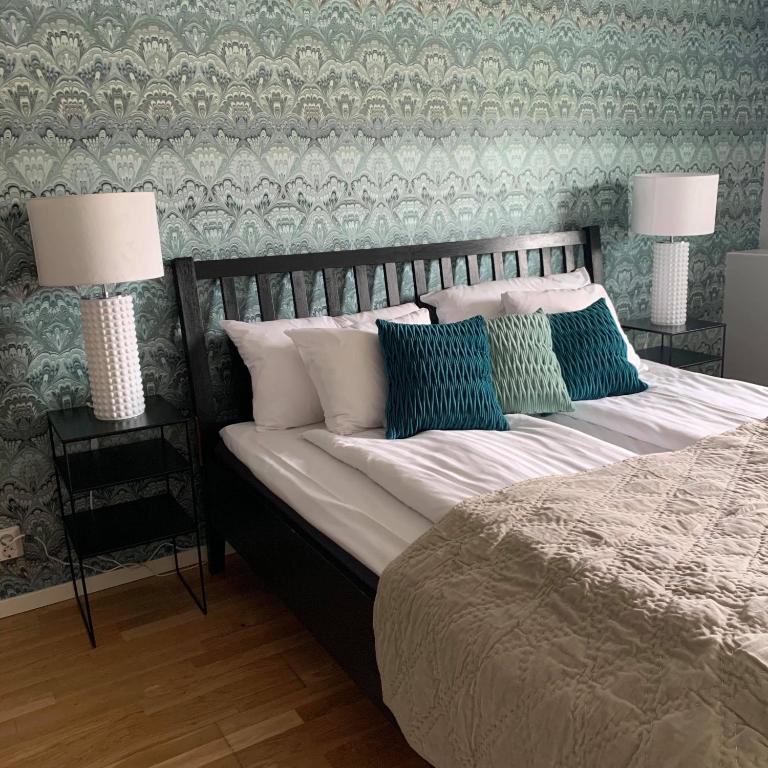 Postel nebo postele na pokoji v ubytování Hotell Ronja