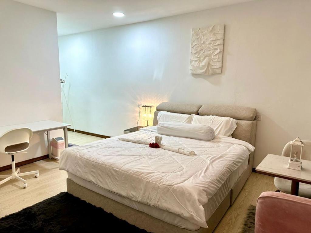 Postel nebo postele na pokoji v ubytování Three Homestay