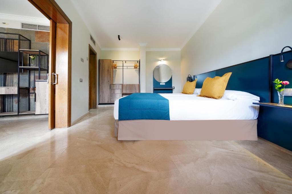 Letto o letti in una camera di Suites & Villas by Dunas