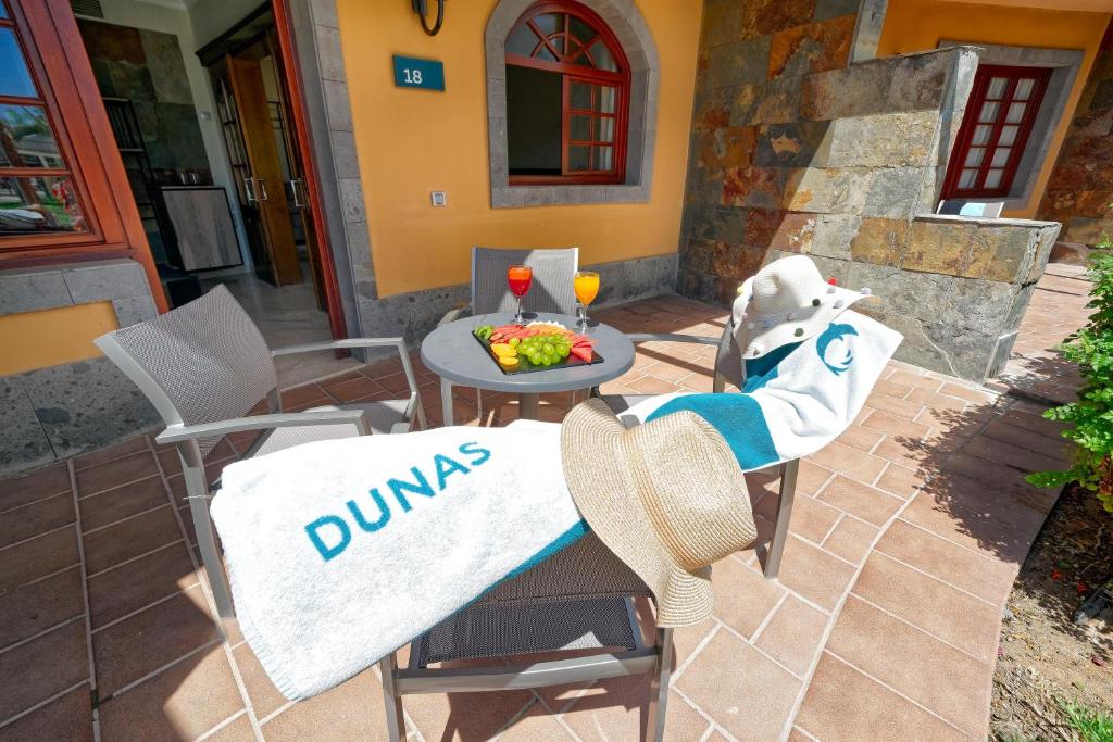 Area soggiorno di Suites & Villas by Dunas