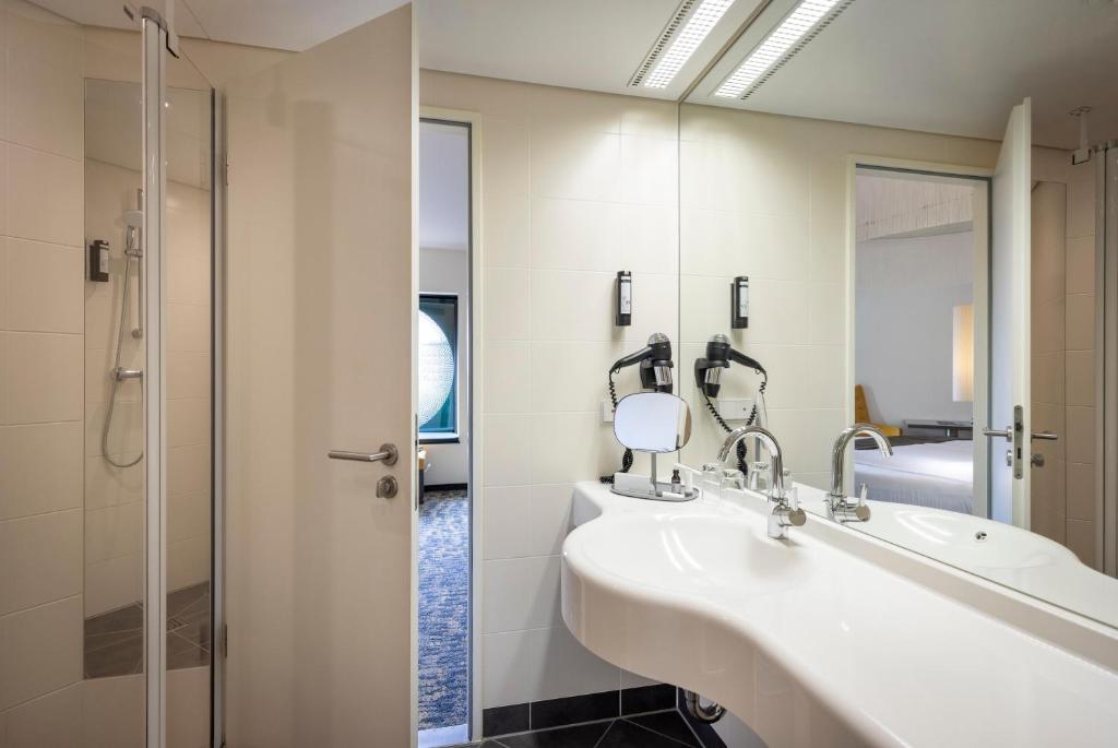 Koupelna v ubytování ARCOTEL Onyx Hamburg