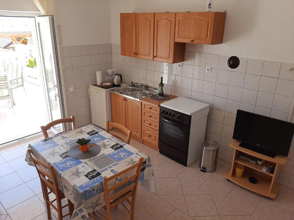 Kuchyň nebo kuchyňský kout v ubytování Apartments Pavelic