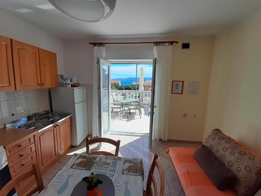 Kuchyň nebo kuchyňský kout v ubytování Apartments Pavelic
