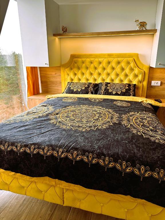 Postel nebo postele na pokoji v ubytování Zlatni apartman Borovi