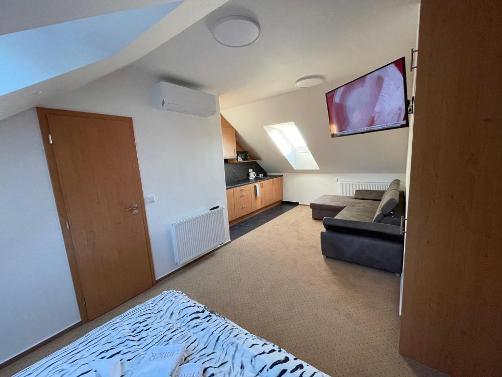 Postel nebo postele na pokoji v ubytování Hotel Antler