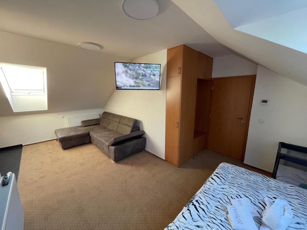 Postel nebo postele na pokoji v ubytování Hotel Antler