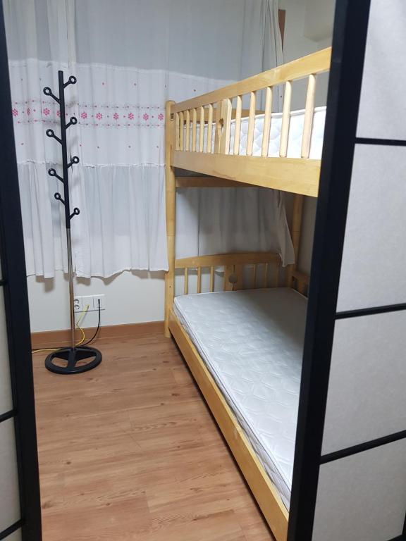 Postel nebo postele na pokoji v ubytování Kory Guesthouse