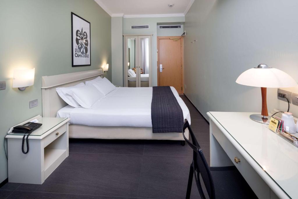 Postel nebo postele na pokoji v ubytování Best Western Hotel Major