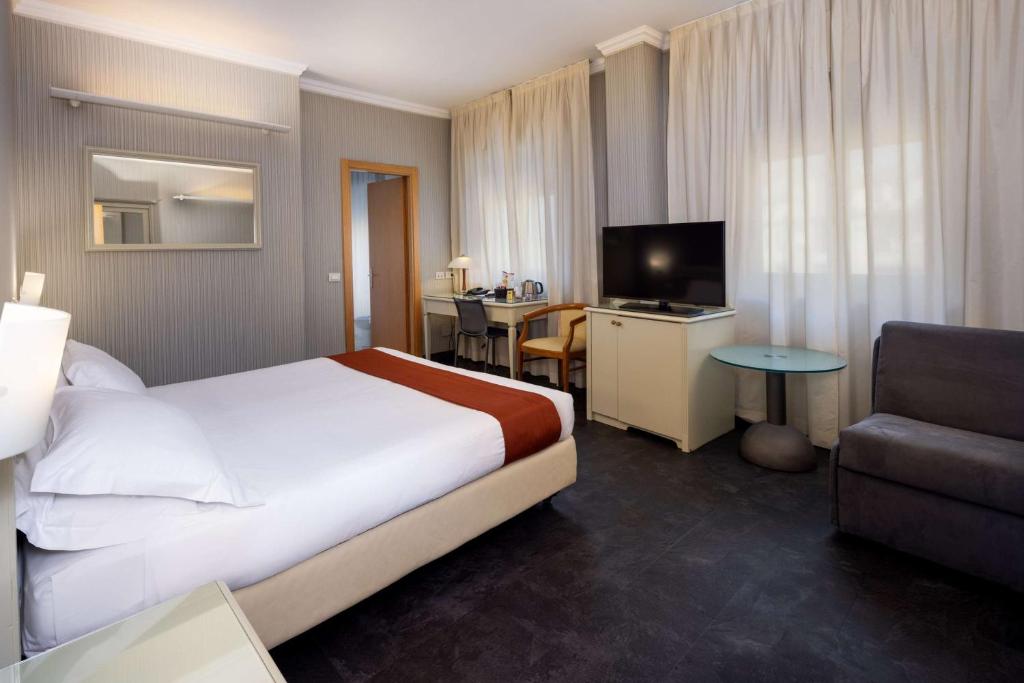 TV a/nebo společenská místnost v ubytování Best Western Hotel Major