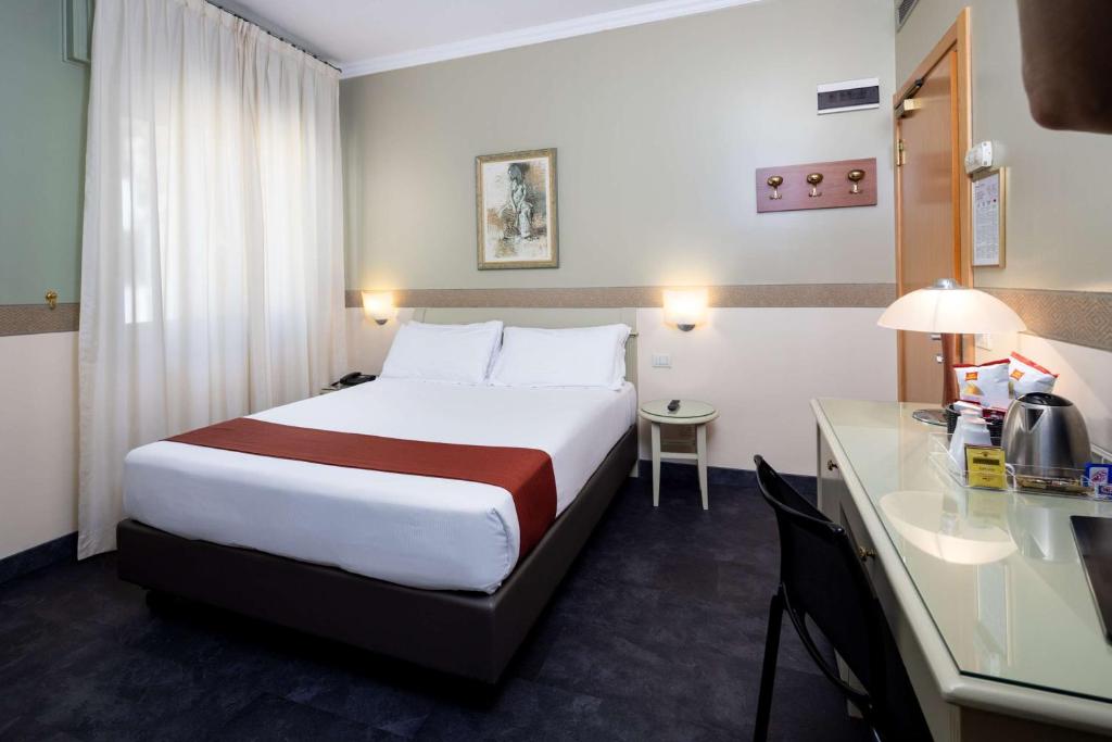 Postel nebo postele na pokoji v ubytování Best Western Hotel Major