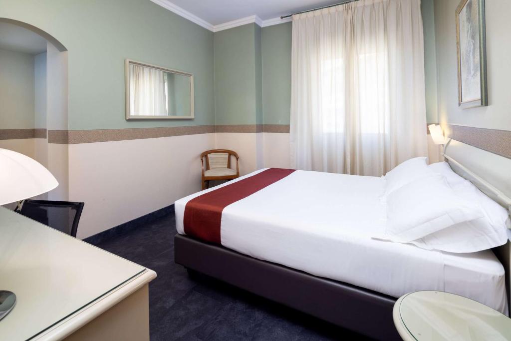 Postel nebo postele na pokoji v ubytování Best Western Hotel Major