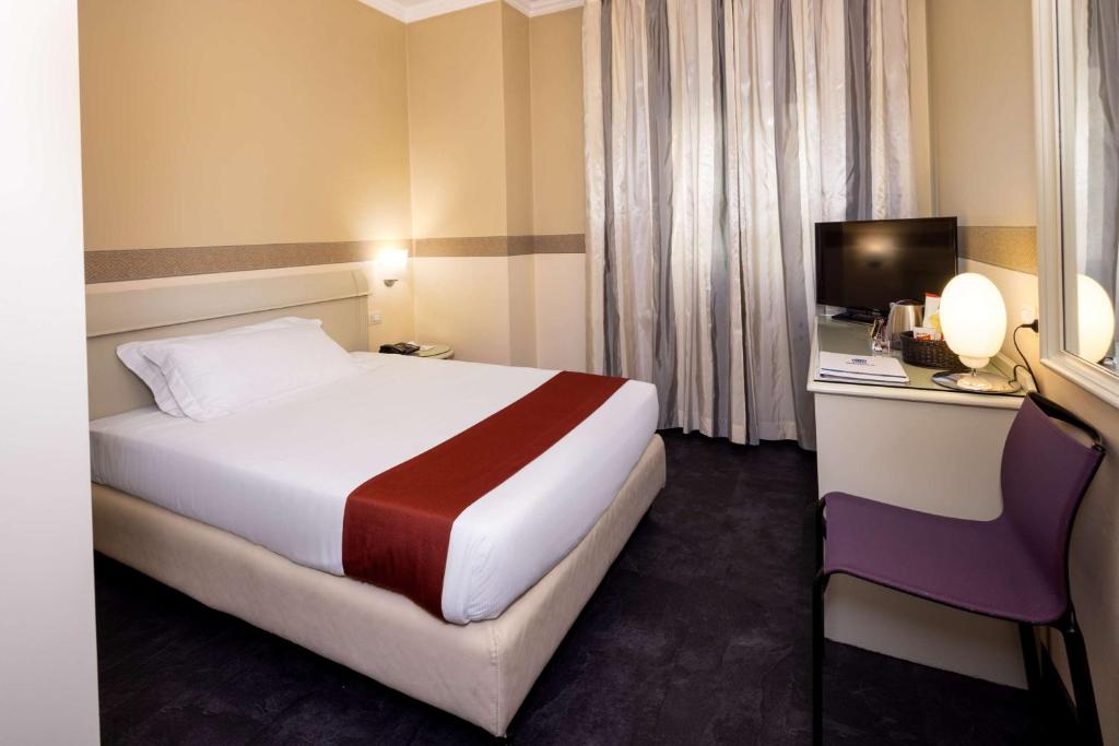 Postel nebo postele na pokoji v ubytování Best Western Hotel Major