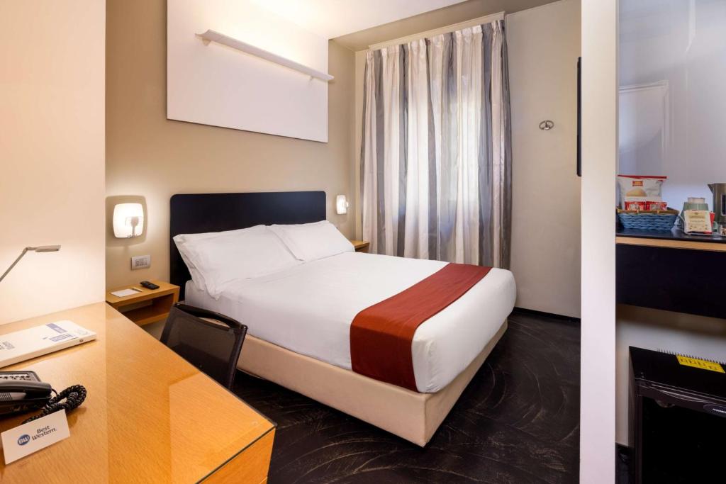 Postel nebo postele na pokoji v ubytování Best Western Hotel Major