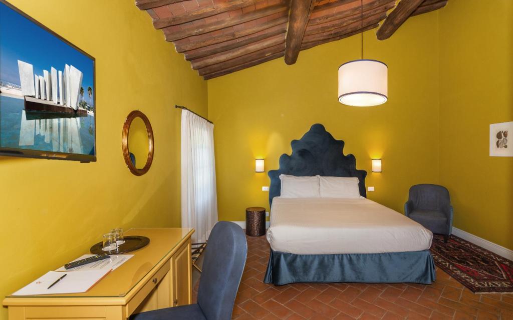 Postel nebo postele na pokoji v ubytování Hotel Albergo Villa Marta