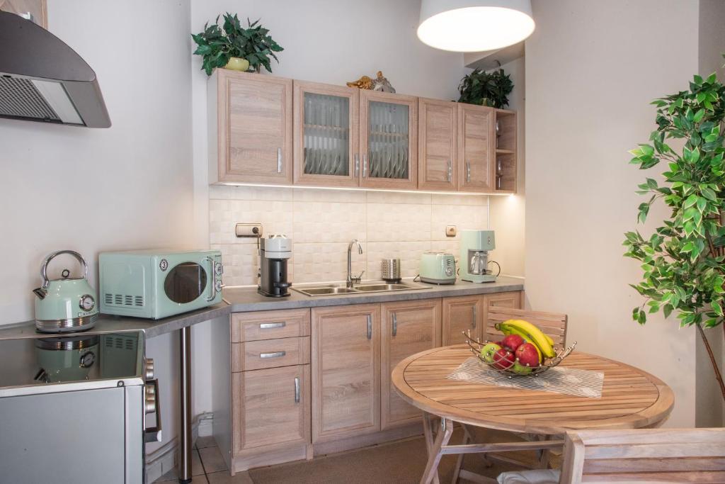 Kuchyň nebo kuchyňský kout v ubytování Vicky's Sky Loft