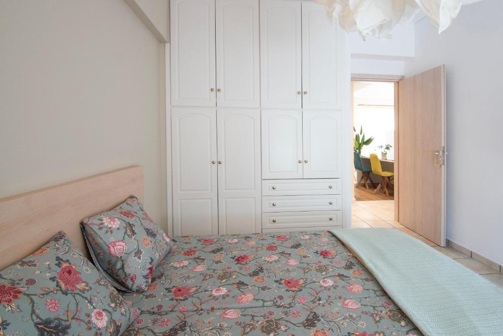 Postel nebo postele na pokoji v ubytování Vicky's Sky Loft